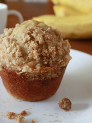 the best banana streusel muffins on a plate