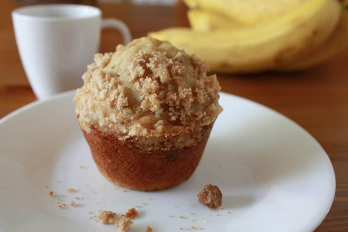 the best banana streusel muffins on a plate