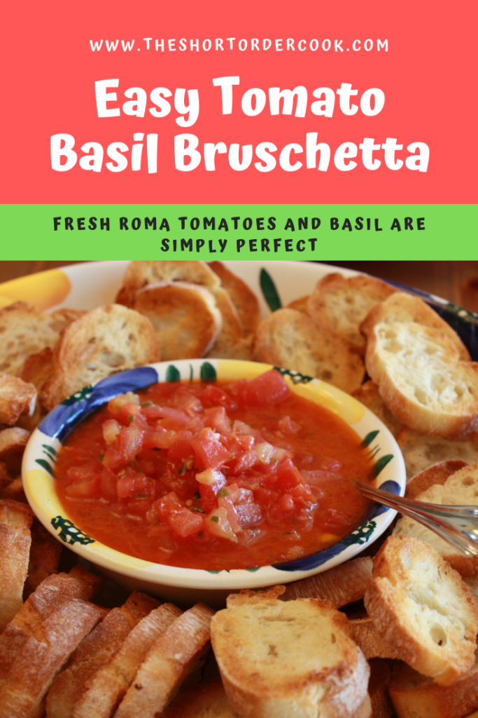 Easy Tomato Basil Bruschetta served in a separate bowl next to toasted bread.
