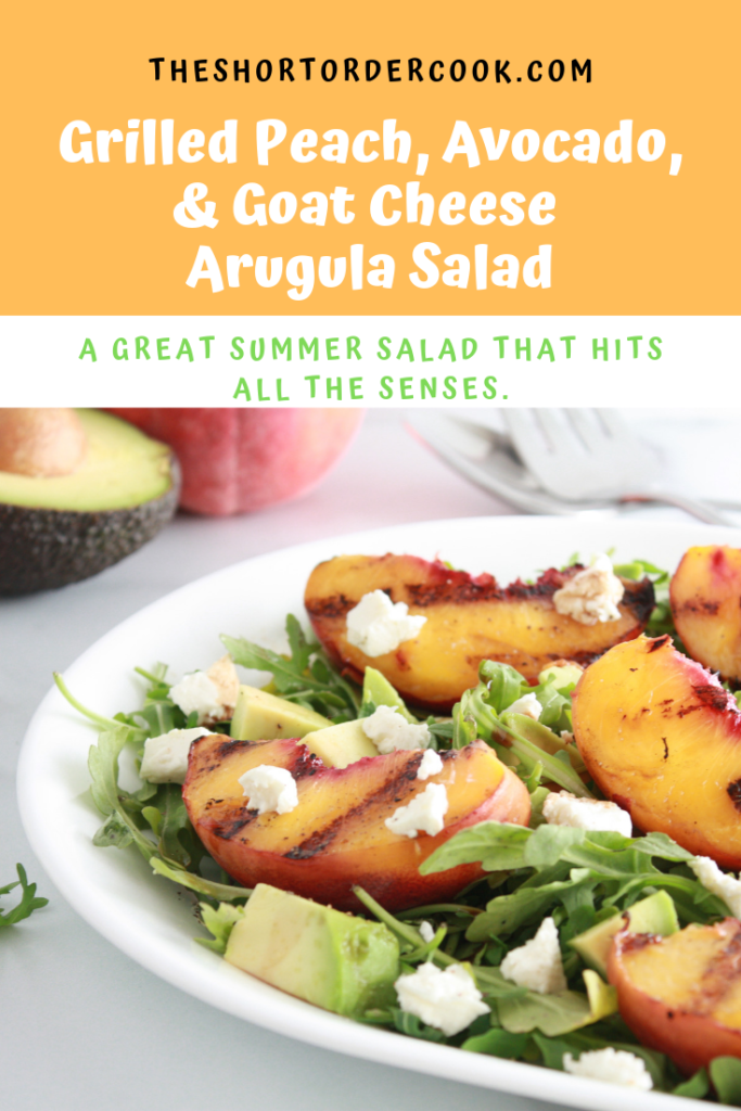 Grilled Peach, Avocado, and Goat Cheese Arugula Salad ready to eat on a platter.