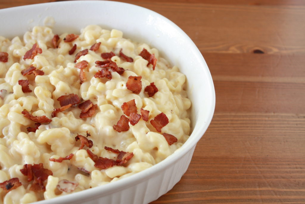 Old-Fashioned Baked Mac & Cheese with Bacon & Onions ready to serve from the casserole dish.