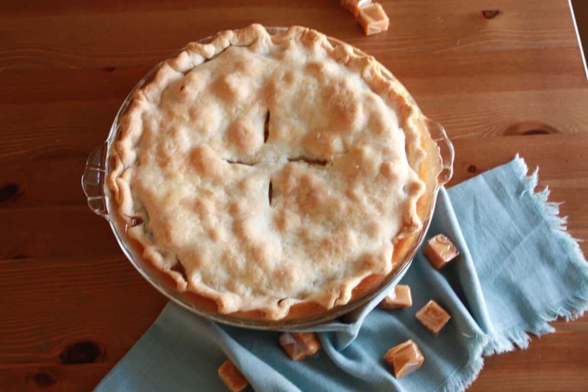 Whole Brown Sugar Caramel Apple Pie ready to slice and serve.