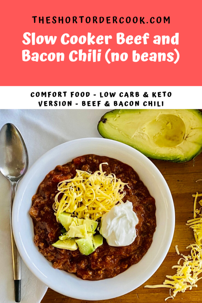 Slow Cooker Beef & Bacon Chili (no beans) in a bowl topped with cheese and avocado. 