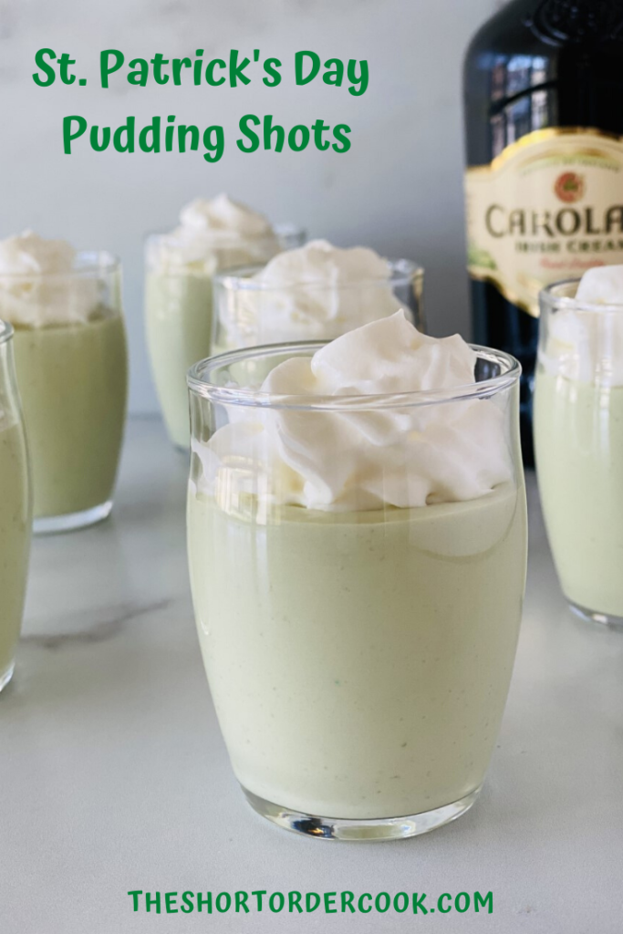 St Patrick's Day Pistachio Pudding in small shot glasses next to Carolans Irish cream liquor bottle 