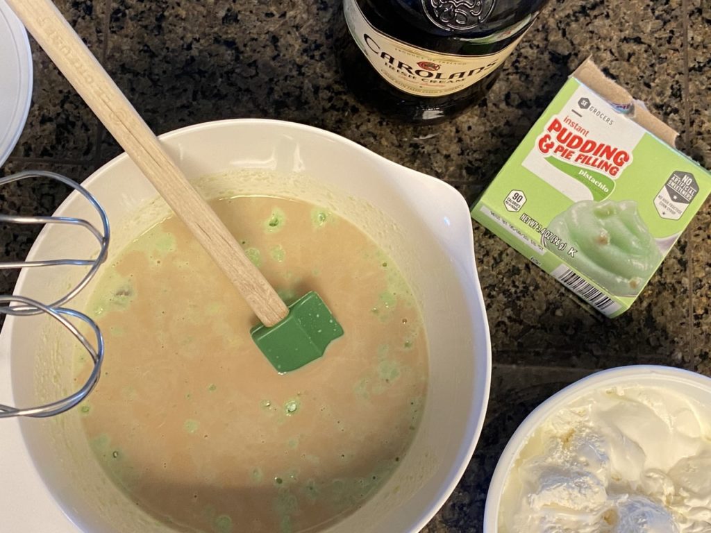 The Irish Cream will mute the green pudding color