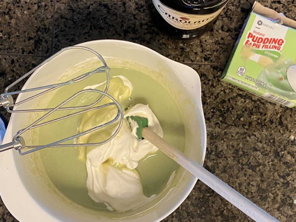 Fold the Cool Whip into the green pudding mix