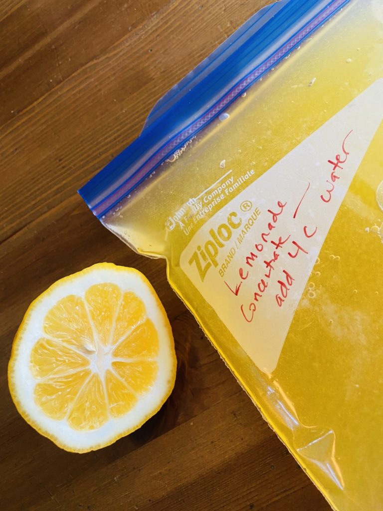 Ziploc labeled and ready to go in the freezer to store lemonade concentrate made at home. 