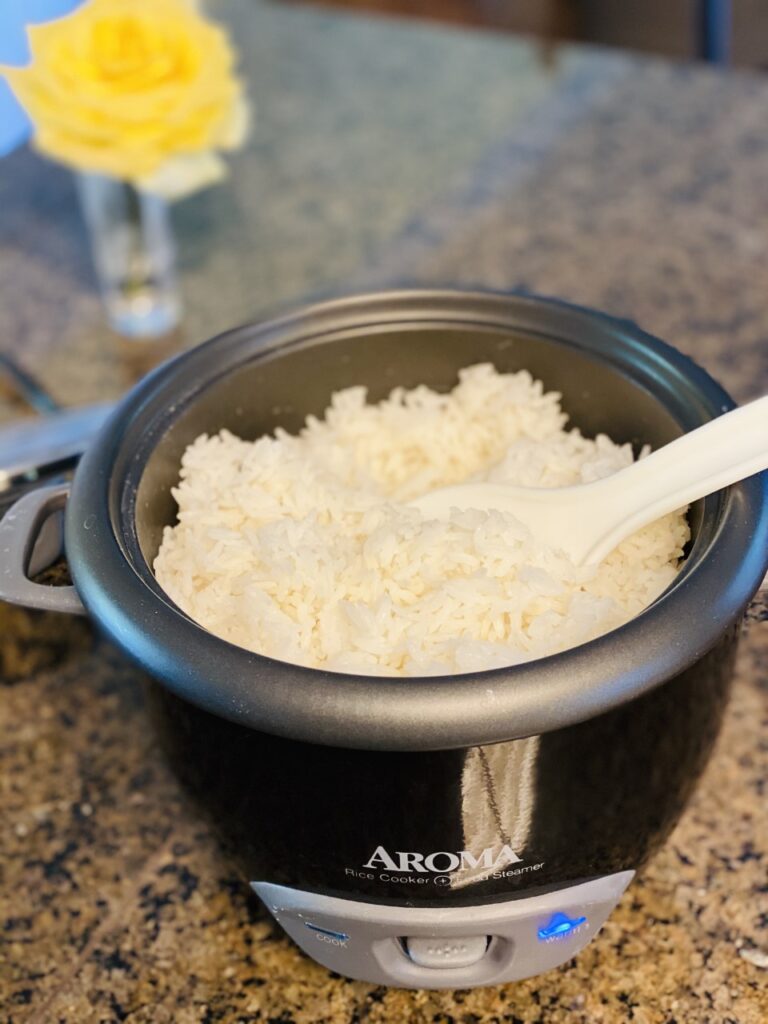 Cooked long-grain white rice in a rice cooker.