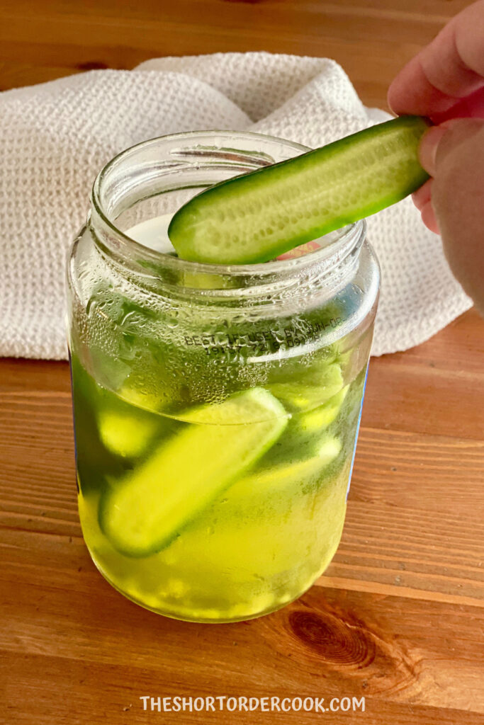 Place cucumbers in jar of leftover pickle juice
