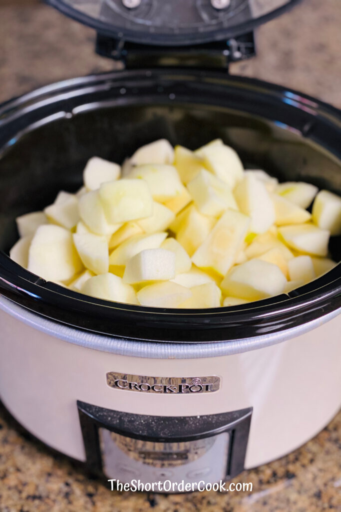 Slow Cooker Apple Sauce apples cut in the crock