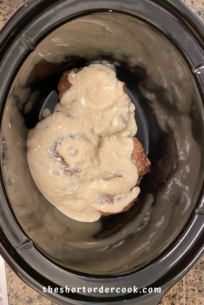 Slow Cooker Salisbury Steak stacking everything in the crock