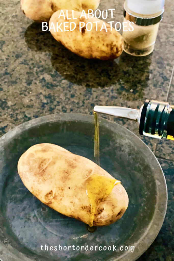 potato being drizzled with olive oil