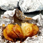Baked potatoes and onion in foil
