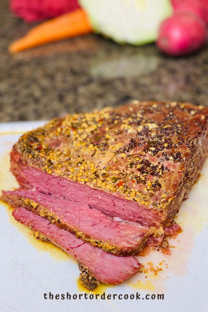 Slow Cooker Corned Beef sliced on cutting board