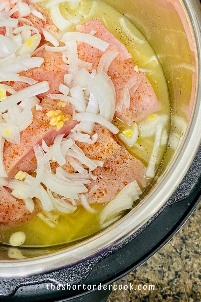 Instant Pot Creamy Chicken Spaghetti all ingredients in the insert