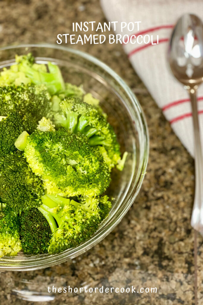 Instant Pot Steamed Broccoli in a bowl ready to eat with a napkin and spoon