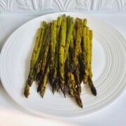 Baked Asparagus on a white platter
