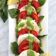 what to serve with meatball subs pesto-caprese-salad-1-768x1024 biteontheside