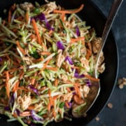 What to Serve with Coconut Shrimp crunchy-asian-broccoli-slaw-garnishandglaze a bowl full of coleslaw