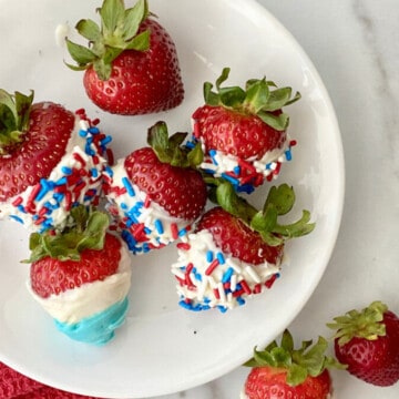 Red, White, & Blue Strawberries for 4th of July featured overhead plate full and napkin