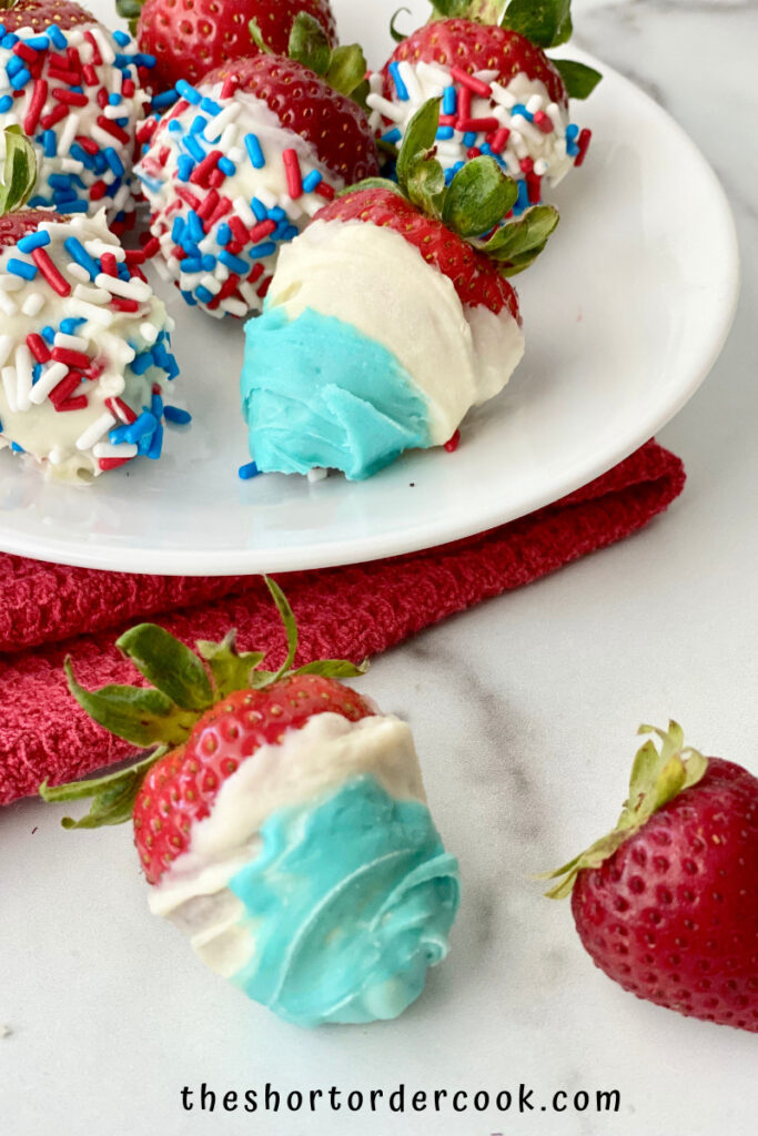Red, White, & Blue Strawberries for 4th of July ready on a plate close up