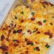What to Serve with Meatloaf ketolowcarbmacandcheese thesixfiguredish overhead photo of a large casserole dish of cheesy bubbling keto mac & cheese