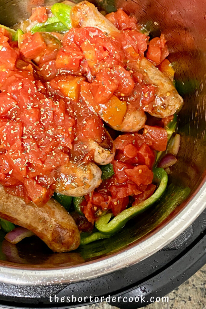 Instant Pot Italian Sausage & Peppers tomatoes and herbs on top