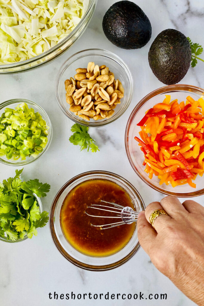 Asian Avocado Peanut Coleslaw whisk the dressing ingredients together