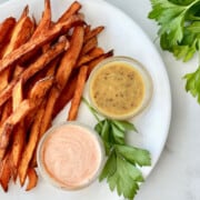 Deep Fried Sweet Potato Fries featured overhead of plate of fries and dipping sauce