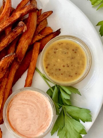 Dips for Sweet Potato Fries featured overhead plate of fries and 2 dipping sauces