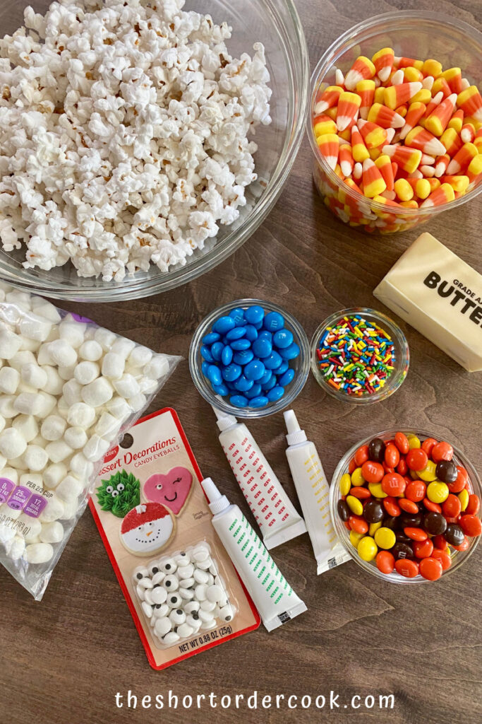 Halloween Popcorn Balls ingredients in bowls on the table