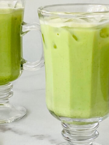 iced Matcha Latte (Starbucks Copycat) featured closeup 2 cups with spoon