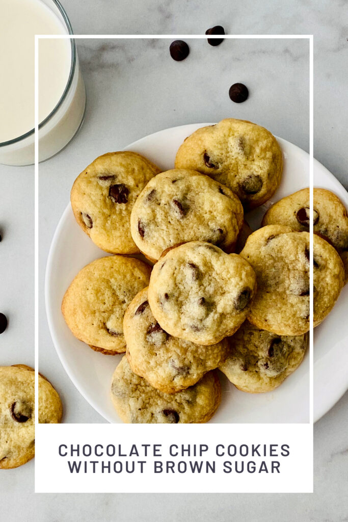 Chocolate Chip Cookies without Brown Sugar PINREDO overhead image of a white plate piled up with cookies and a glass of milk to the side