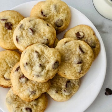 Chocolate Chip Cookies without Brown Sugar featured overhead of a plate of cookies and a glass of milk