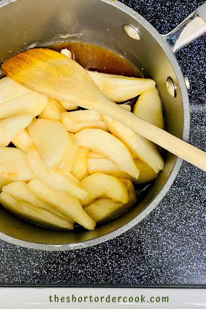Stewed Pears add sliced fruit to the pot