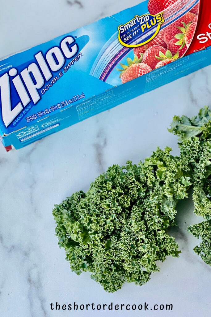 Can You Freeze Kale? a box of ziploc bags and fresh kale on the counter