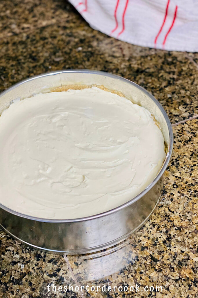 Cheesecake in the springform pan ready to put in the fridge.