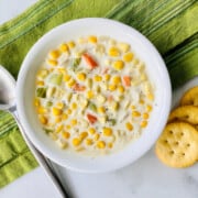 Slow Cooker Chicken & Corn Soup recipe card bowl of soup and crackers