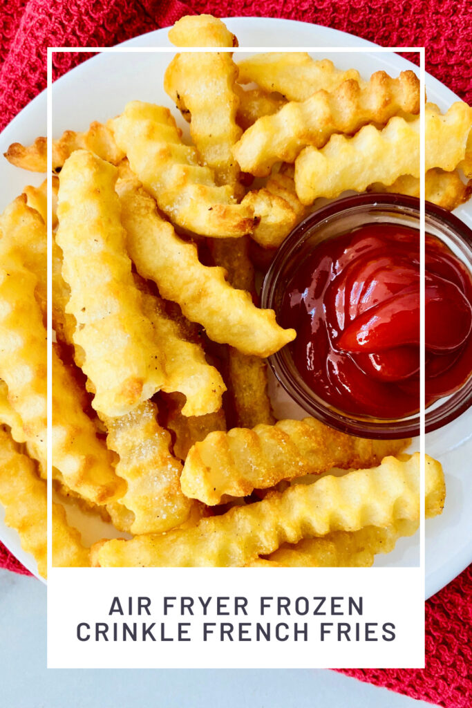 Air Fryer Frozen Crinkle French Fries PINREDO closeup overhead image of plated fries and ketchup
