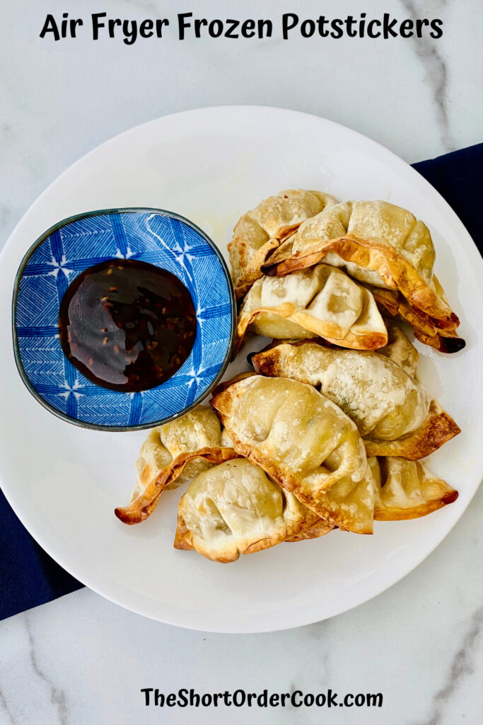Air Fryer Frozen Potstickers PN1 potstickers plated with dish of dipping sauce