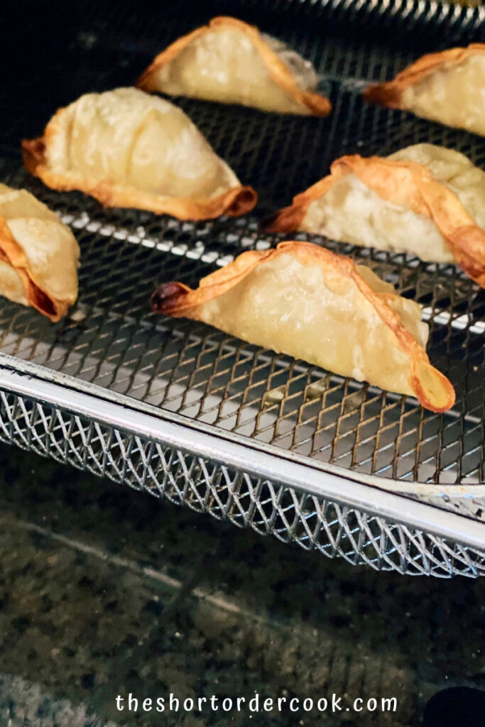 Air Fryer Frozen Potstickers crispy in the air fryer ready to serve