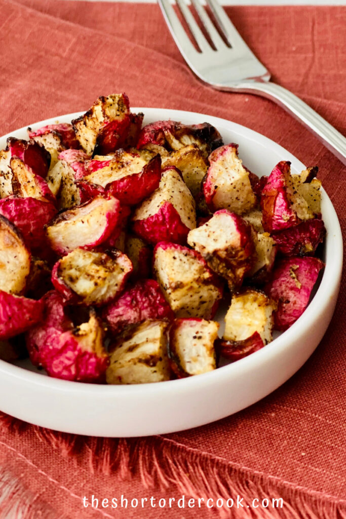 Crispy Air Fryer Keto Radishes plated ready to eat with fork and cloth napkin