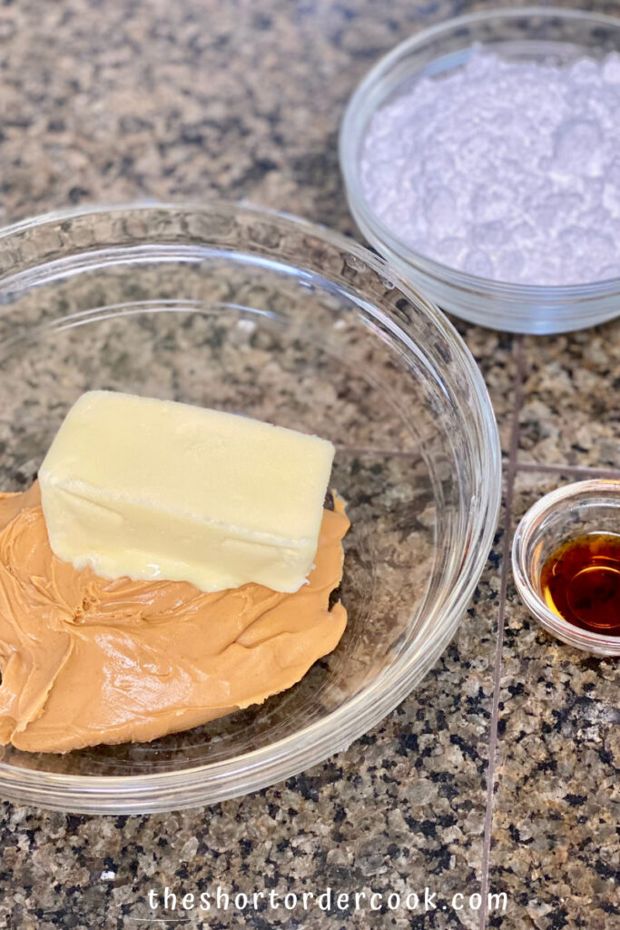 Easy Old-Fashioned Peanut Butter Fudge softened butter added to peanut butter in a microwave safe bowl