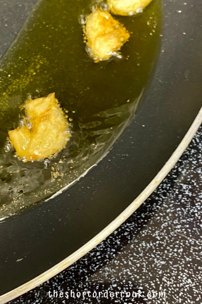 Garlic infused olive oil in a skillet