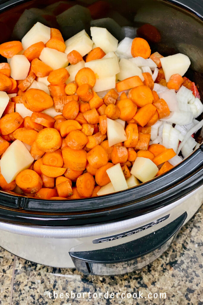 Slow Cooker Hungarian Goulash vegetables added to the CrockPot