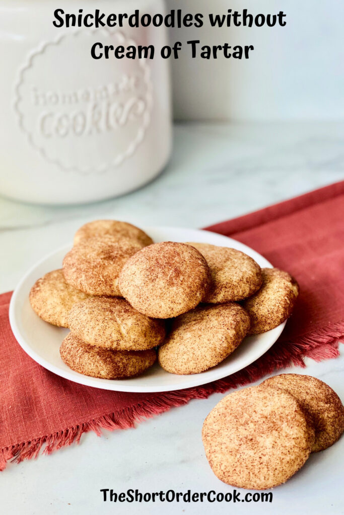 Snickerdoodles without Cream of Tartar PN1 plated cookies and a cookie jar in the background