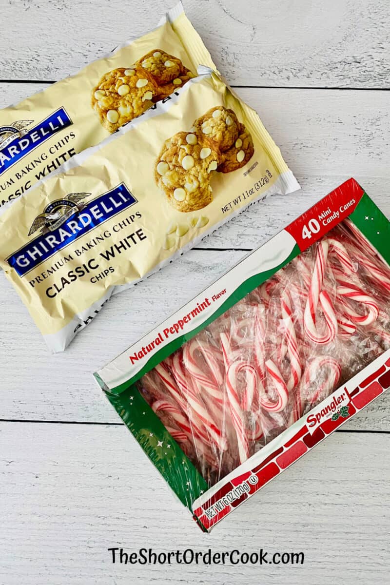 2-Ingredient Peppermint Bark ingredients bags of white chocolate chips and a box of tiny candy canes