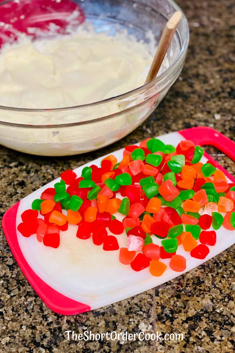Gumdrop Nougat nougat ready in a bowl and gumdrops ready on the cutting board