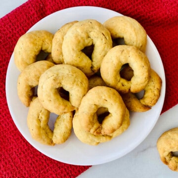 Taralli - Italian Pepper Cookies overhead plated with a red napkin