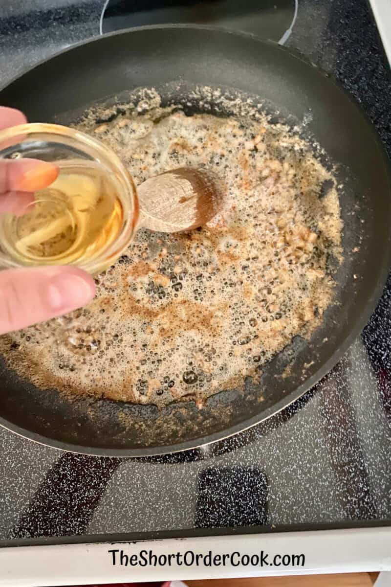 Lobster Ravioli Sauce browned butter with shallots and garlic in the pan while adding the brandy